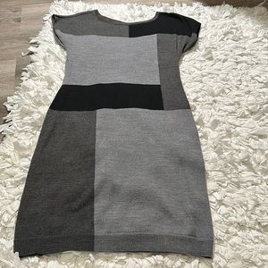The limited woman dress size medium, sweater like material